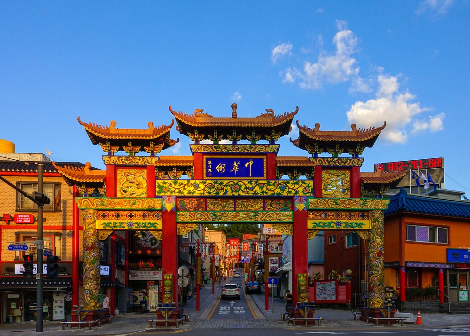 The ornate red-and-gold paifang gate marking the entrance to Incheon Chinatown